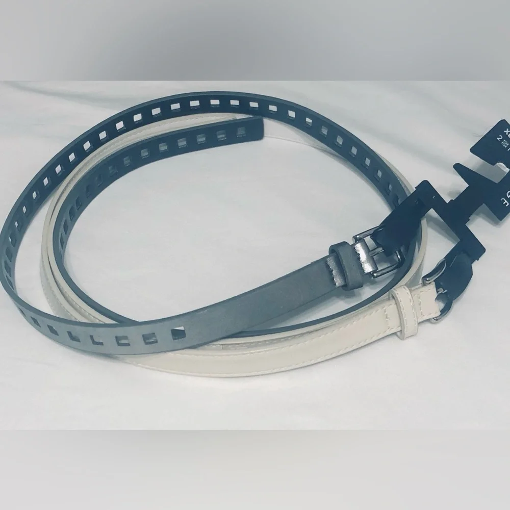 Women’s 2 pack belt white silver manmade materials.XL